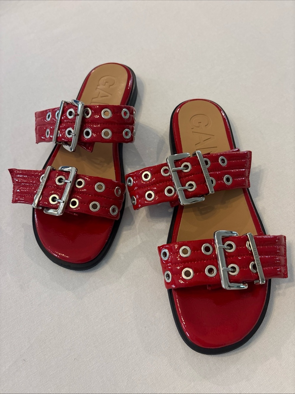 Ganni Women’s Red Patent Double-Buckle Slide Sandals with Eyelet Detail. Size 41